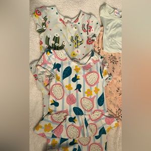Three rompers and a bonus Tshirt. EUC